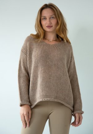 - Sweter