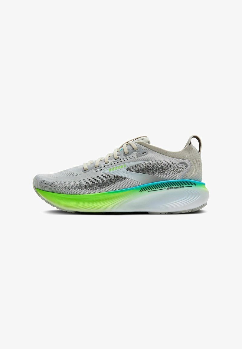 Scarpa da corsa leggera con tomaia in mesh grigio, suola a gradiente verde e blu e dettagli riflettenti. Presenta una suola imbottita per il comfort.