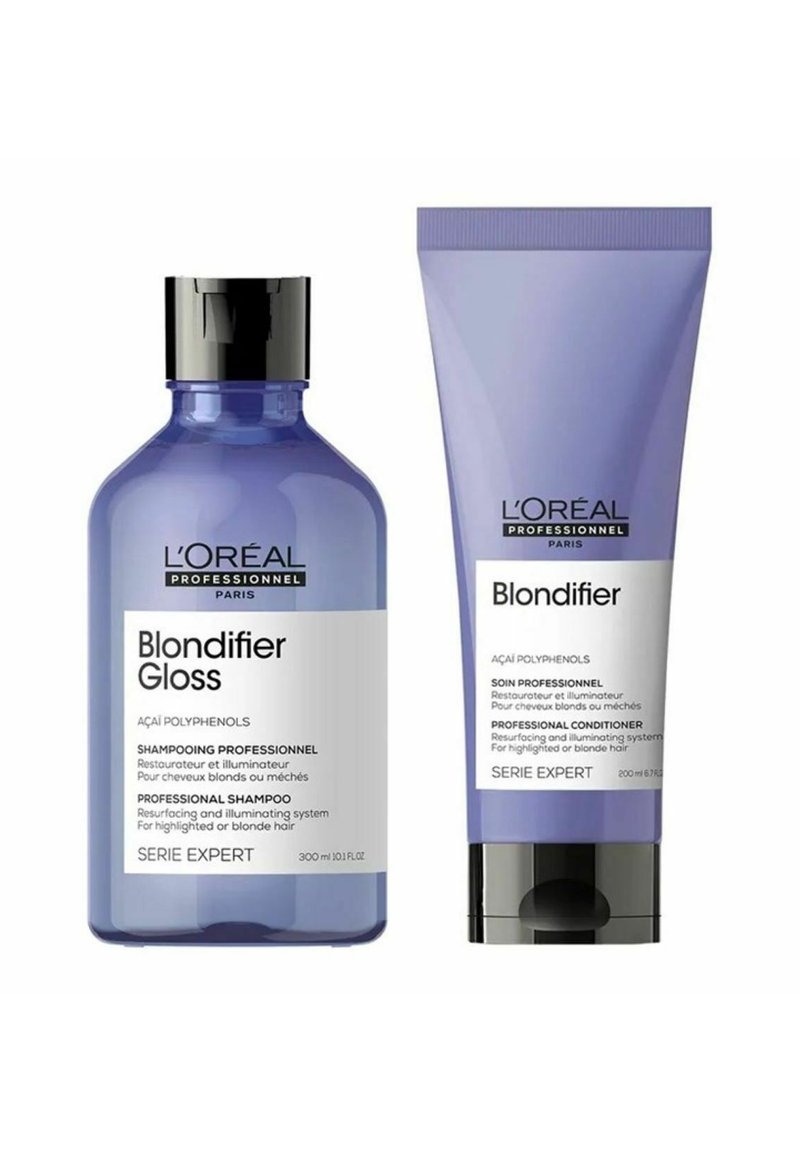 L'Oréal Professionnel Blondifier shampoo and conditioner set. The bottles are purple with black accents and feature clear labels with product details.