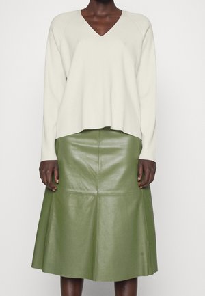 Stickad tröja - off-white