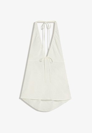 Haut blanc à col licou avec un décolleté en V profond et des liens ajustables au niveau du cou et du dos, coupe ample avec ourlet arrondi.
