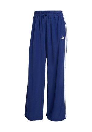 Navy blue athletic pants with a wide leg, elastic waistband, and white side stripes. Features an Adidas logo on the upper left side.