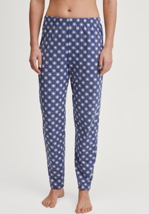 Blauwe pyjamabroek van zachte stof, met een zonnestraalpatroon in het wit. Ontspannen pasvorm met een elastische tailleband en taps toelopende benen.