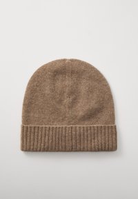 Pruun kangast beanie müts pehme tekstuuriga, millel on soonikserv ja ümar ülaosa. Valmistatud sooja ja paindliku materjali tõttu.