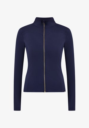 Marineblauw jasje met ritssluiting, gemaakt van gladde stof met een opstaande kraag en lange mouwen. Voorzien van een gouden ritssluiting en gebogen naaddetails.