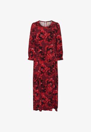 Dolga, rdeča cvetna obleka s krožnim izrezom, elastičnimi manšeti in ključavnico na hrbtni strani. Obleka ima velike črne in rdeče cvetlične vzorce.