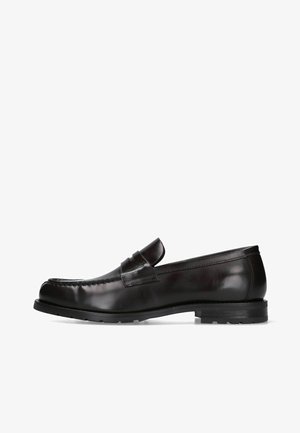 Black leather penny loafer shoe with a low heel and stitched detailing on the front and sides, shown from the outer side.