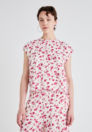 Top leggero con motivo floreale, dal taglio leggermente cropped e dal fit rilassato. Presenta maniche corte e pieghe verticali in tonalità di bianco e rosa.