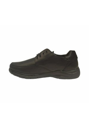 Zapato de cuero negro con puntera redondeada, perfil bajo y diseño de cordones. Presenta costados texturizados y una suela de goma acolchada para mayor comodidad.