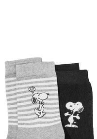 Calcetines grises y negros con diseños de dibujos animados de Snoopy; un par tiene rayas verticales, mientras que el otro es de color sólido. Material de mezcla de algodón.