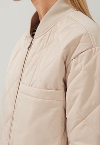 someday. Vinterkappa /-rock - beige