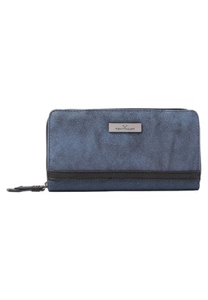 Blue suede wallet with a smooth texture, featuring a black zip and a metallic logo accent. Compact, rectangular shape with a zipper closure.