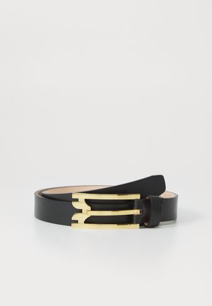 Black leather belt with a smooth texture, featuring a gold-tone buckle with geometric cutouts. The belt is flat and adjustable.