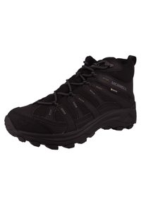 Schwarzer wasserdichter Wanderschuh aus Mesh und Gummi, mit einem hohen Knöcheldesign, strukturiertem Obermaterial und robustem Profilsohle.