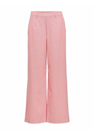 Vide bukser med vertikale røde og hvite striper, med en tettsittende midje og folder, laget av et lett stoff.