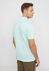 Lacoste Polotričko - aquarium