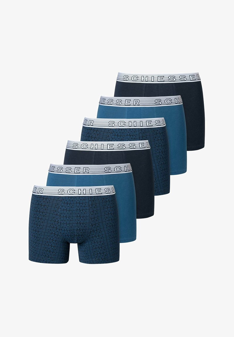 Verpakking van zes heren boxershorts met verschillende tinten blauw, zachte katoenmateriaal, elastische tailleband met een herhalende merknaam en patroon details.