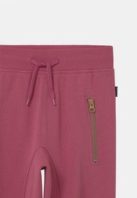 Molo ASHLEY - Tracksuit bottoms - wildrose