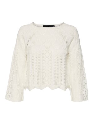 Suéter de punto, color crema, diseño corto, presenta patrones de calados y un dobladillo con volantes, con mangas largas y anchas y un escote redondo.