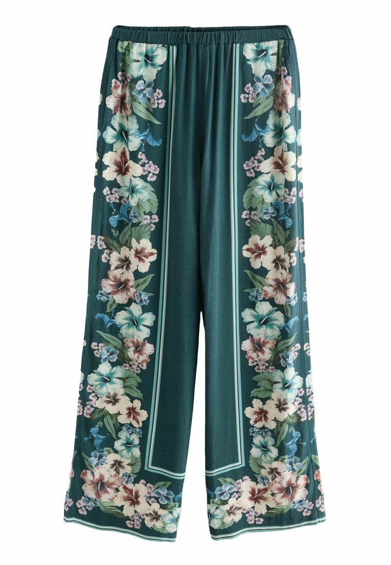 Teal wijde broek met verticale bloemenpatronen in navy en crème langs de zijkanten. Zachte stof met een elastische tailleband.