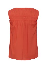 Haut sans manches de couleur orange vif, avec des détails froncés au niveau du col, en tissu doux, et une coupe en A avec une silhouette fluide.