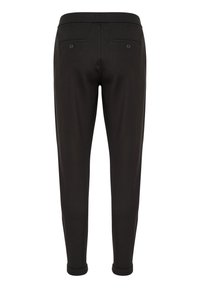 Black trousers with a smooth texture, tailored fit, elastic waistband, and two rear pockets with buttons. Cuffed hem at the ankles.
