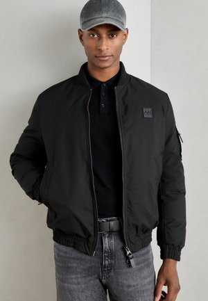 REGULAR FIT IN DOBBY WITH DUPONT SORONA AND LOGO ON PATCH - Bombejakke - black