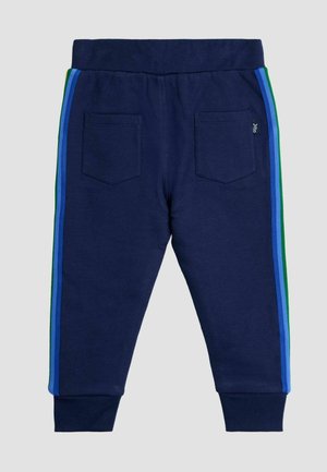 Navy sweatpants made of cotton, featuring side stripes in green, blue, and light blue, with two back pockets and elastic waistband.