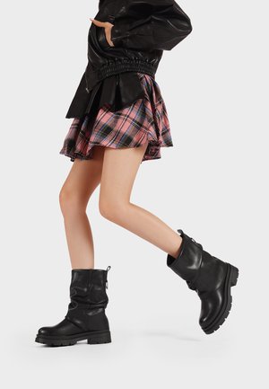 Stivaletti con plateau - nero