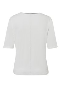White short-sleeve top featuring a round neckline and a central back seam. Soft, lightweight fabric with a smooth texture. Minimalist design.