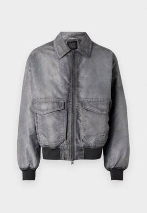 Gray bomber jacket with a smooth texture, zip front, two large chest pockets, and ribbed cuffs and hem. Features a classic collar design.
