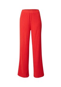 Wijdere broek in helder rood. Gemaakt van een gestructureerde stof met een elastische tailleband. Kenmerkt zich door een ontspannen pasvorm en een volle lengte.