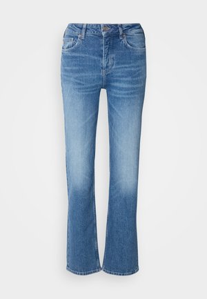 Lys blå denim flared jeans. Har høy midje, fem lommer og sømdetaljer. Myk tekstur med en falmet vaskeeffekt.