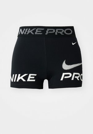 Pantaloni corti sportivi neri Nike Pro con loghi e testo bianco Nike sulla cintura e sul davanti.