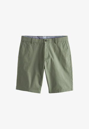 Olivově zelené šortky vyrobené z měkkého bavlněného materiálu. Mají zapínání na knoflík, poutka na opasek a boční kapsy. Hladká textura bez vzorů.