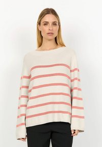 Beige knit sweater with pink horizontal stripes, wide neckline, and long sleeves. Fabric shows ribbed texture and relaxed fit.