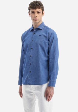 Denim shirt in light blue with long sleeves, button-down collar, front buttons, and an embroidered accent on the chest.