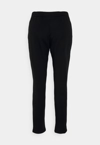 Svarta sweatpants med rak benform, elastisk midja och mjuk, slät tygtextur. Inga fickor eller ytterligare detaljer.