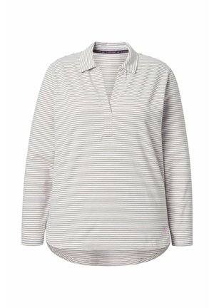 Maglietta a maniche lunghe di un grigio chiaro con sottili righe verticali. Presenta un colletto e un orlo leggermente più lungo sul retro. Tessuto morbido e strutturato.