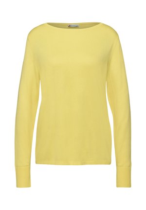 Suéter amarillo de manga larga con un escote amplio. Textura suave, con puños y dobladillo acanalados. Diseño simple sin patrones ni acentos adicionales.