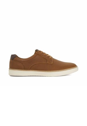 Brown leather sneaker with rounded toe, lace-up design, and white rubber sole. Features a contrasting brown heel and stitched detailing.