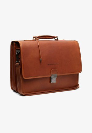 Brown leather briefcase with a top handle, flap closure, metallic clasp, and stitching details. Features a side zip pocket for additional storage.