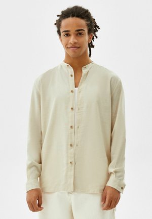 RELAXED FIT - Koszula - beige