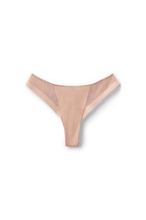 String beige avec panneaux latéraux en maille transparente et devant central lisse, posé à plat sur un fond blanc.