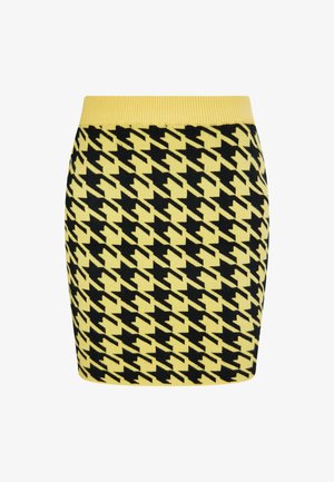 Kötött mini szoknya sárga és fekete hounds-tooth mintával, bordás sárga derékkal és testhez simuló fazonban.