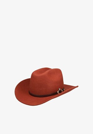 Rust-colored felt cowboy hat with a braided dark brown band and gold buckle detail on a white background.