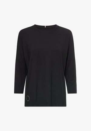 Black long-sleeve t-shirt made of soft fabric, featuring a rounded neckline and a small text design near the hem on the left side.