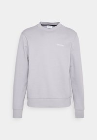 Sudadera gris de cuello redondo hecha de una suave mezcla de algodón. Presenta puños y dobladillo de canalé, con un pequeño logo blanco en el lado izquierdo del pecho.