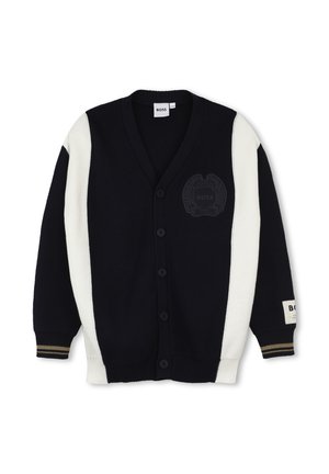 Cardigan de botones en blanco y negro con paneles laterales blancos verticales y logo BOSS en el pecho y el puño de la manga.