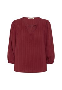 Burgundy blouse with ribbed texture, round neckline, and tie detail at the front. Features long, gathered sleeves and a relaxed fit.